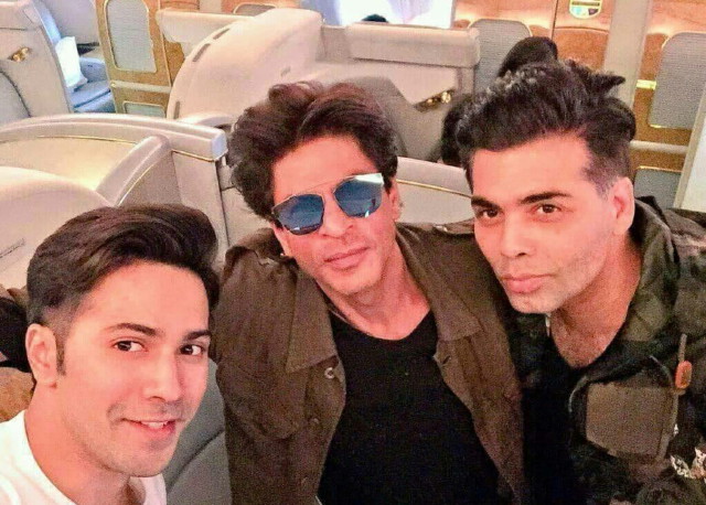 SRK spotted with Varun and Karan inside their plane